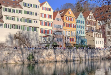 Tübingen, Neckar front, the trees of the Neckar island cast their shadows on the bank wall