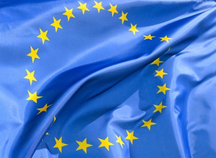 EU flag with 27 stars, close-up, wave pattern