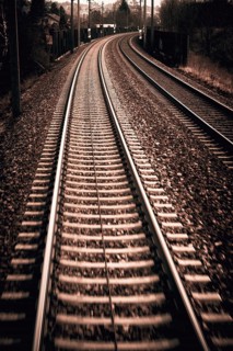 Austria, Upper Austria, Linz, Wels . Railway tracks seen from a moving train between Linz and Wels