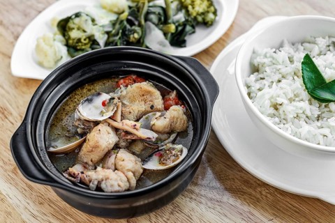 Traditional fish clams and mixed seafood portuguese spicy soup stew meal