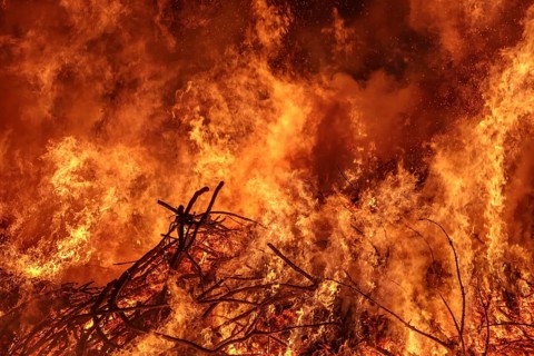 Easter fire with flames and smoke Burning wood with flames and smoke