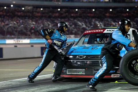 The crew of Niece Motorsports work on the car prior to performs a pit stop on pit road during the