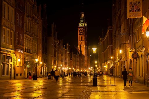 Gdansk Poland, May 2022 View of Dlugi Targ and Dluga Street in Old Town at night. Main Town Hall at