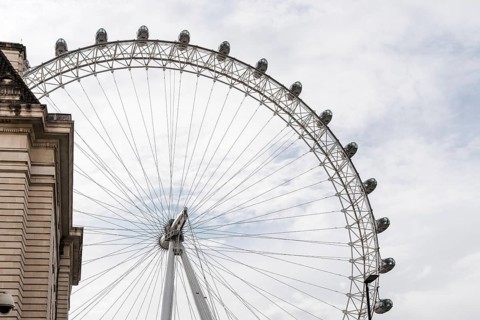London, UK, August 26, 2023: The London Eye against cloudy sky