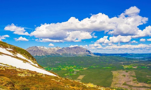 Beautiful valley landscape panorama Norway of Hydalen Hemsedal with snowed in Mountains in summer