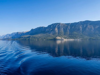 Mountain range by the sea in the morning light, panoramic shot, Makarska Riviera, near Makarska,