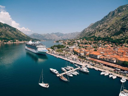 Top view of the pier with a big boat and town. Drone photo