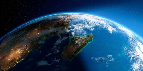 Highly detailed Earth with atmosphere, exaggerated relief and light-flooded cities. Transition from