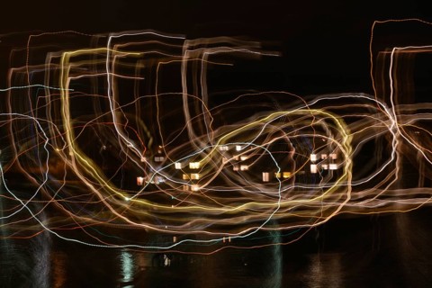 Light painting, light trails and reflections at night - long exposure