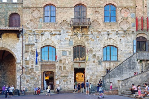 The fascinating facade of Palazzo Nuovo del Podesta on the Piazza del Duomo in San Gimignano,
