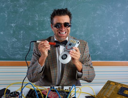 Nerd electronics technician silly retro teacher welding self made robot