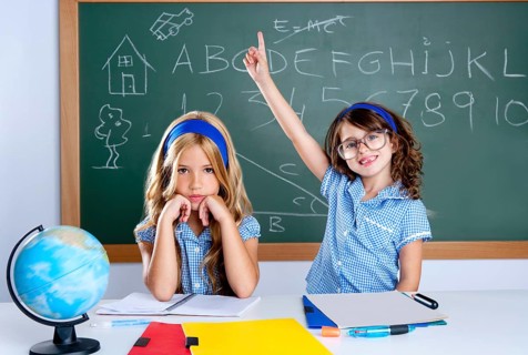 Smart nerd student in classroom raising hand with sad friend