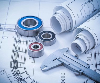 Close up image of construction drawings slide caliper rolling bearings on blueprint architecture