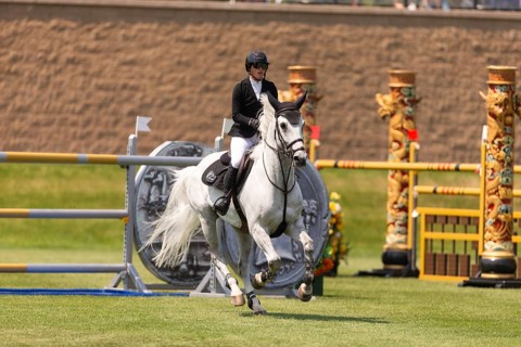 Carly Campbell-Cooper of Canada and riding Baretino, compete in the 1.60m Grand Prix during The