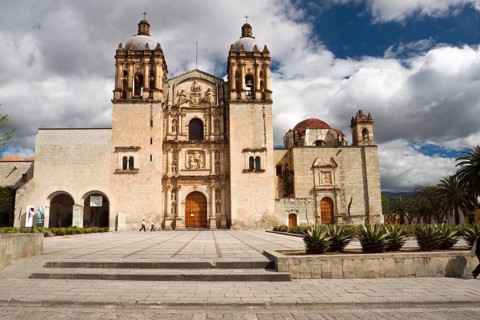 Church of St Domingo founded in 1575 is ornate plaster statues and colored stucco flowers. Oaxaca,