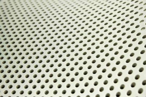 Periodic structures. Relief surface of the plastic surface with circular holes