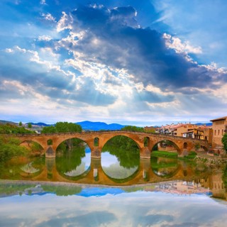 Puente de la Reina in Saint James Way bridge over Arga River in Pamplona