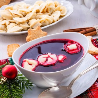 Red barzcz with uszka a polish christmas soup