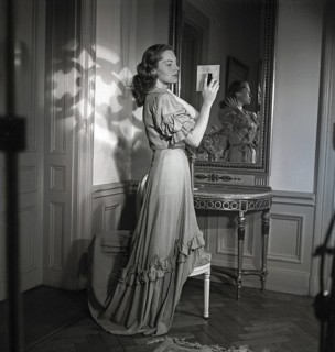 Viveca Lindfors. Swedish-American Actress. 1920-1995. She is looking at herself in two mirrors to