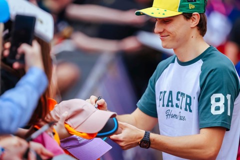 MELBOURNE, AUSTRALIA - MARCH 13: Oscar Piastri of Australia and McLaren Formula 1 Team with fans
