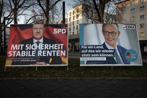 Election posters of the candidates for chancellor Olaf Scholz (SPD, left) and Friedrich Merz (CDU,