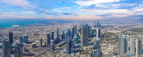 UAE, Dubai panoramic skyline view of city financial downtown and Dubai Mall.