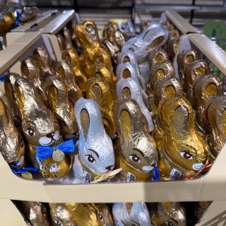 Display on retail shelf of wholesale chocolate Easter bunnies chocolate Easter bunnies wrapped in