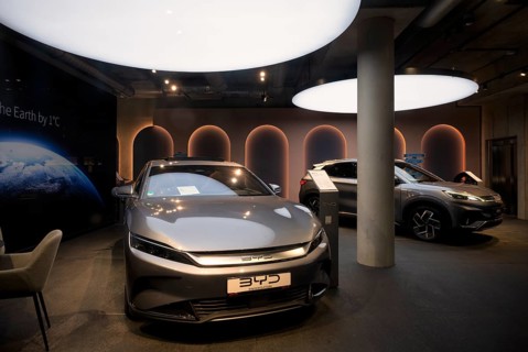 View through shop window to showroom, sales exhibition of the car brand BYD Build Your Dreams,