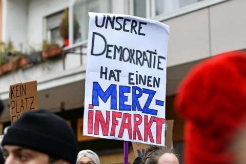 Heidelberg, Germany - February 12th 2025: Protest sign against CDU politican Friedrich Merz at