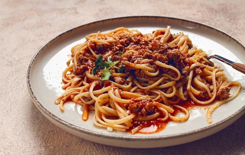 Spaghetti Bolognese, top view, close-up, without people, homemade