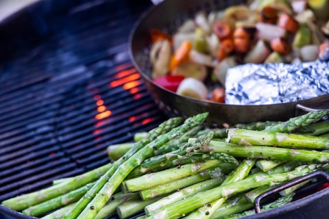 Barbecue, kettle grill with vegetarian and vegan barbecue grills such as grill pan and green