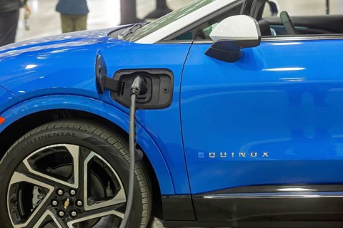 Detroit, Michigan USA - 10 January 2025 - The Chevrolet Equinox EV, plugged into a charging station