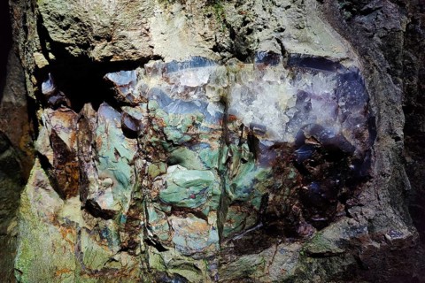 Green jasper with rock crystal in the visitor gallery of the Steinkaulenberg gemstone mines,