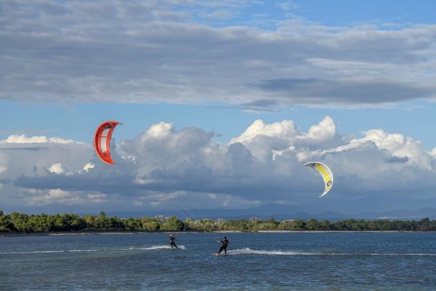 Kite surfers on Grado Pineta beach, Grado island, Friuli Venezia Giulia region, Italy, Europe