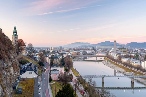 View of the Mülln parish church, Salzach with Müllnersteg, sunset, Salzburg City, Salzburg