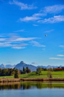 Mountain panorama at Grundweiher near Rückholz, in the background on the right Säuling (2047 m), on