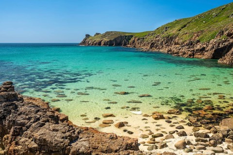 Coastal landscape. sandy beach beach and rocks in Nanjizal Bay or Nanjizal Beach. St Just,
