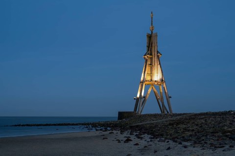 Illuminated Kugelbake, landmark, blue hour, North Sea, Lower Saxony Wadden Sea National Park,
