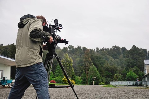 Cameraman at work in a housing area