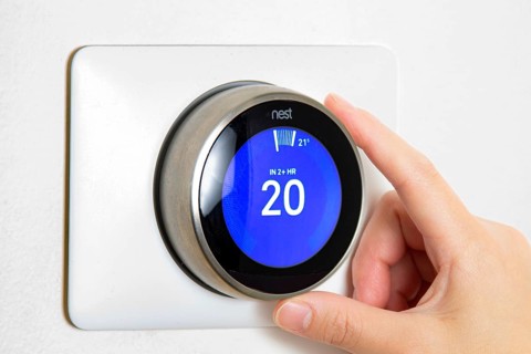 Calgary, Alberta, Canada. Jun 5, 2020. A person cooling down Home Air Conditioning, temperature is