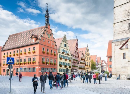 DINKELSBUEHL, GERMANY - SEPTEMBER 27: Tourists in the old town of Dinkelsbuehl, Germany on