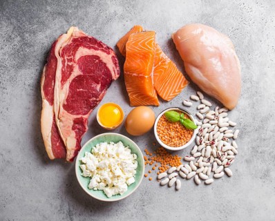 Assortment of natural sources of protein from food: meat, fish, chicken, dairy products, eggs,