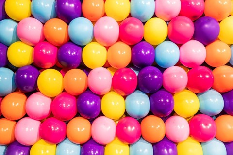 Colorful balloons background, real photo, concept of celebration, party, happy, surprise