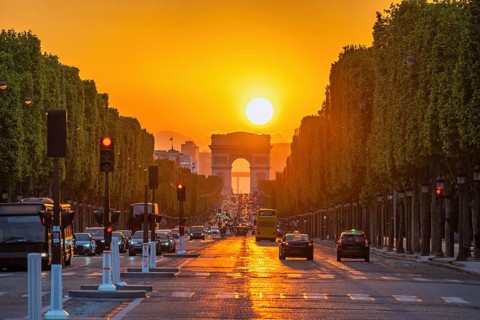 Paris France, city skyline sunset at Arc de Triomphe and Champs Elysees