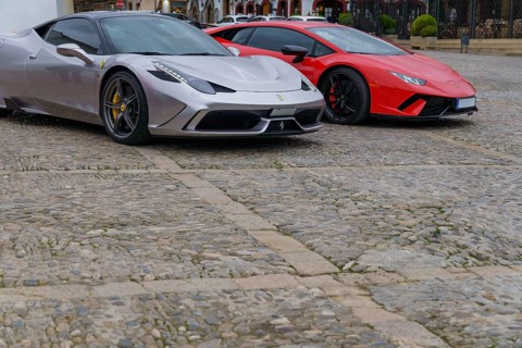 Ronda, malaga, spain 11-27-2024 two beautiful Ferraris parked on a cobblestone street with copy