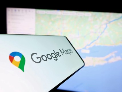 Stuttgart, Germany, 03-10-2023: Smartphone with logo of web mapping platform Google Maps on screen