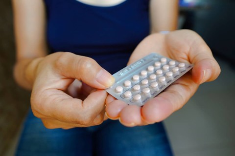 March 16, 2024, Brazil. A woman holds her birth control pill. The medication is a pill that