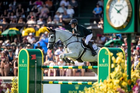 Hilary Scott of Australia and riding Oaks Milky Way compete in the first round of the 1.60m CPKC