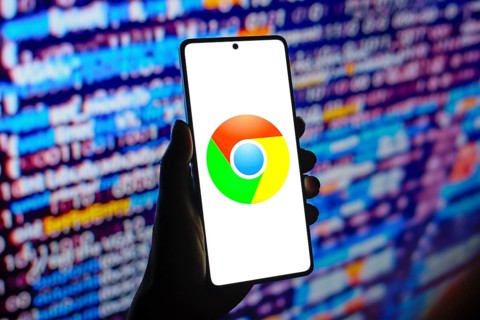 In this photo illustration, the web browser Google Chrome logo is displayed on a smartphone screen