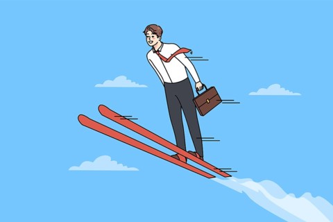 Businessman on ski jump high achieve work success or goals. Smiling man employee or worker strive